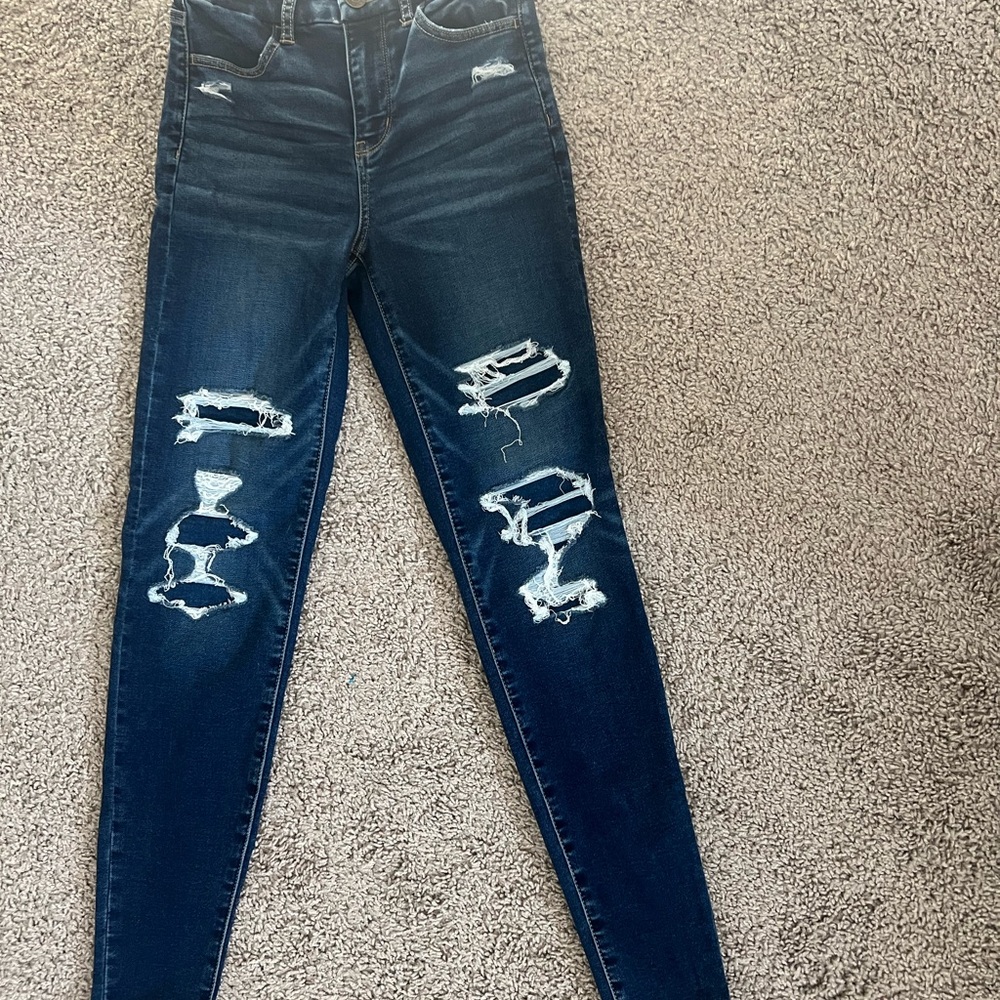 Distressed Blue Denim Jeans